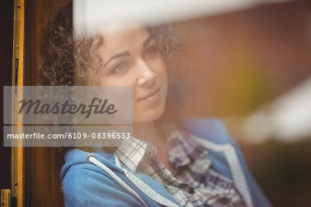 Pretty student sitting by the window