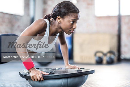 Muscular woman doing fitness workout Muscular woman doing fitness workout