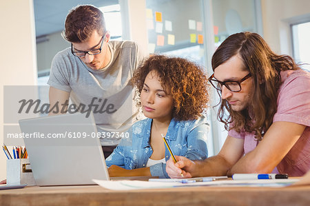 Business people working at desk in office