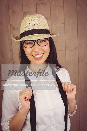 Smiling attractive hipster posing for camera