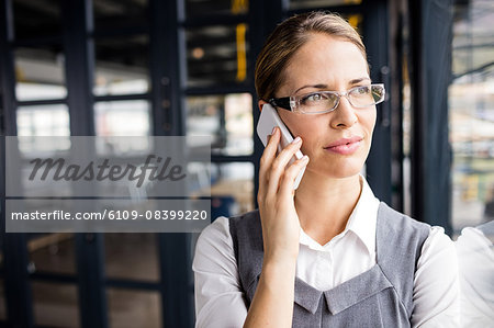 Portrait of a thoughtful businesswoman having a phone call