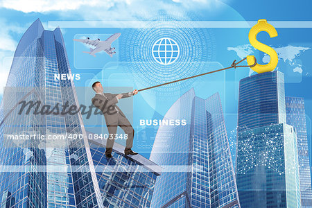 Businessman climbing skyscraper holding golden dollar sign