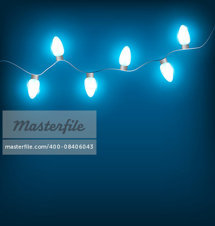 White led Christmas lights garland on blue background