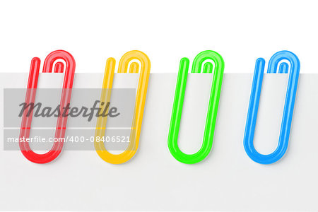 Row of Colourful Plastic Paper Clips on White Background