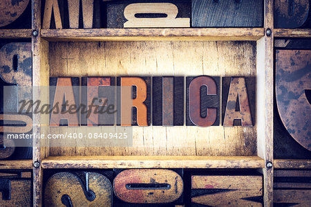 The word "Africa" written in vintage wooden letterpress type.