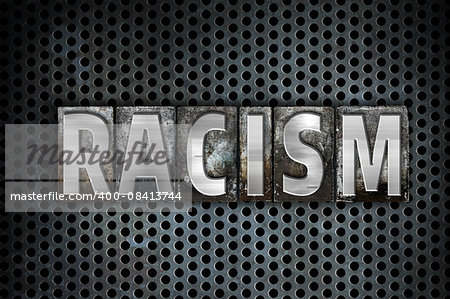 The word "Racism" written in vintage metal letterpress type on a black industrial grid background.