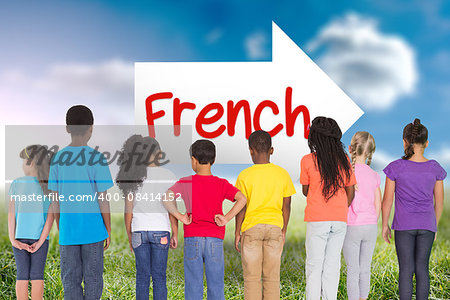 The word french and elementary pupils in a row against sunny landscape