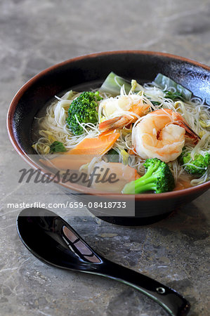 Rice noodle soup with king prawns