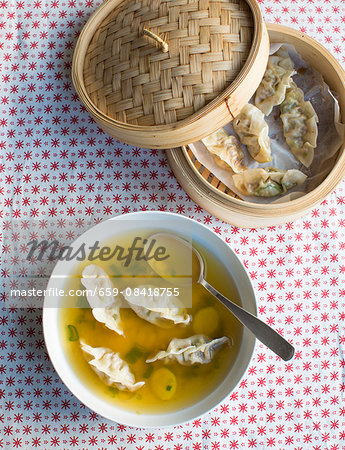 Clear ginger broth with steamed dumplings (China)