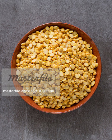 Chana Dal (split chickpeas) in a terracotta dish Chana Dal (split chickpeas) in a terracotta dish
