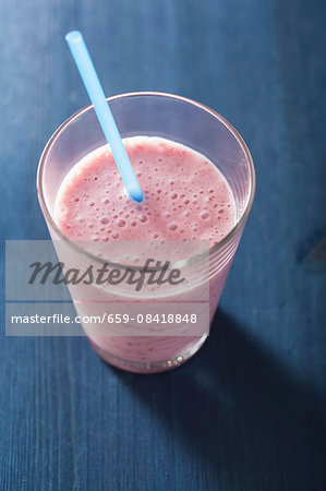 A vegan strawberry smoothie made with soy milk