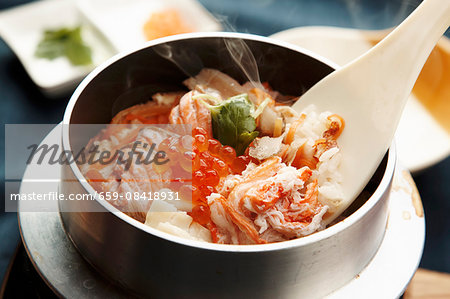 Kamameshi (Japanese rice dish) with seafood