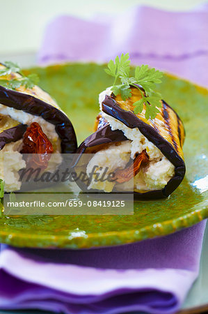 Aubergine rolls with goat's cream cheese, dried tomatoes and olive oil Aubergine rolls with goat's cream cheese, dried tomatoes and olive oil