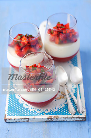 Strawberry jelly with vanilla panna cotta, fresh strawberries and mint Strawberry jelly with vanilla panna cotta, fresh strawberries and mint