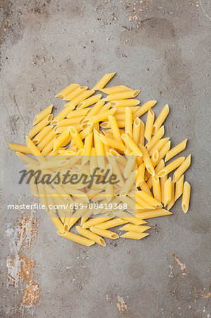 A pile of penne rigate pasta