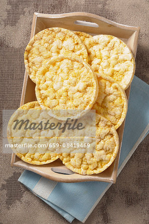 Corn crackers on a wooden tray
