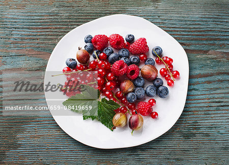 Fresh berries on a white plate