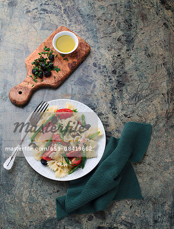 Pasta with green beans and trout fillet