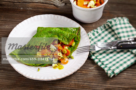 Spinach pancakes with a feta and carrot medley