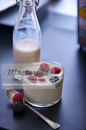 A vanilla smoothies with red berries