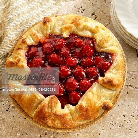 Cherry tart with a puff pastry crust