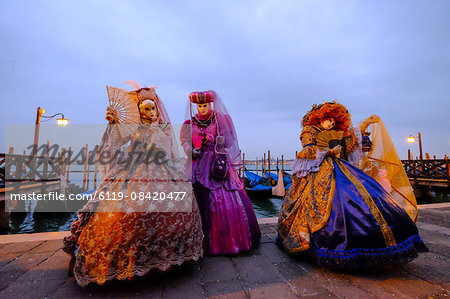 Masks and costumes at St. Mark's Square during Venice Carnival, Venice, Veneto, Italy, Europe