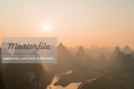 Sunset over Karst peaks with Li river (Lijiang) view from hilltop of Mt. Laozhai (Laozhaishan/Old fortress hill), Xingping, Yangshuo, Guilin, Guanxi, PRC