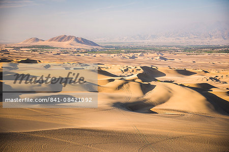 Sand dunes in the desert at Huacachina, Ica Region, Peru, South America