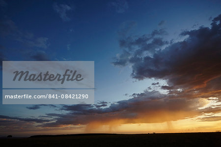 Rain and sunset on the Maasai Mara plains, Kenya, East Africa, Africa