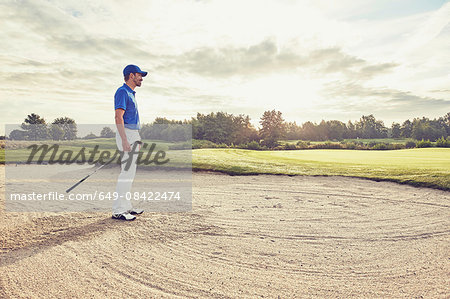 Golfer in sand trap, Korschenbroich, Dusseldorf, Germany