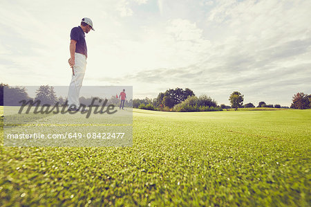 Golfer on course, Korschenbroich, Dusseldorf, Germany