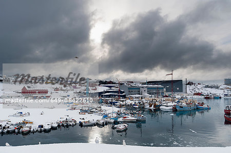 Elevated view of storm clouds over harbour, Ilulissat, Greenland