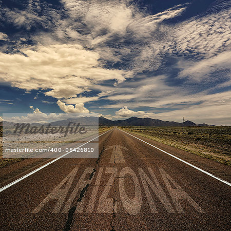 Conceptual image of desert road with the word Arizona and arrow