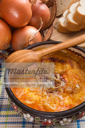 French onion soup in a ceramic bowl.