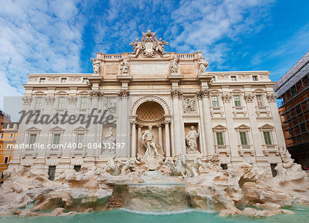 restored facade of Fountain di Trevi in Rome at day, Italy