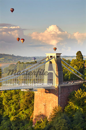Clifton Suspension Bridge, with hot air balloons in the Bristol Balloon Fiesta in August, Clifton, Bristol, England, United Kingdom, Europe