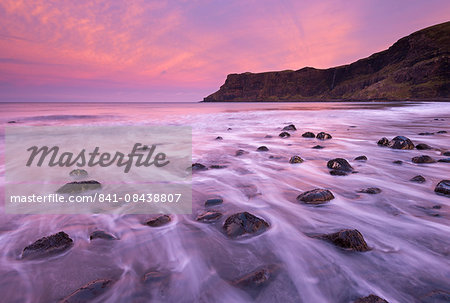 Colourful pink sunrise above Talisker Bay, Isle of Skye, Inner Hebrides, Scotland, United Kingdom, Europe