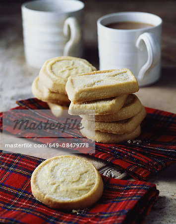 Luxury Scottish all butter shortbread biscuits stacked on tartan tea towel