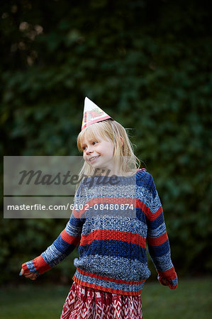 Girl wearing party hat