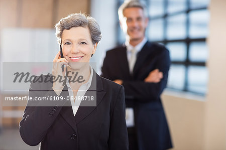 Businesswoman smiling at the camera at the office