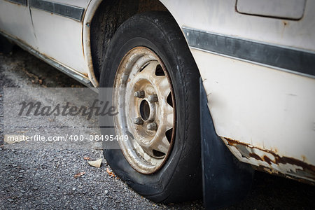 Close up Flat tire on the road waiting for repair