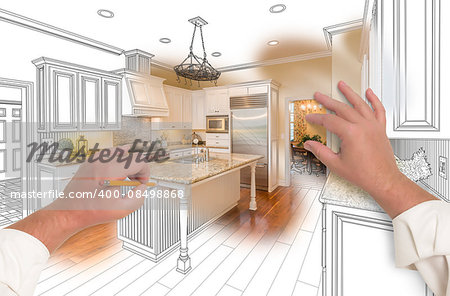 Male Hands Sketching with Pencil A Custom Kitchen with Photo Showing Through.