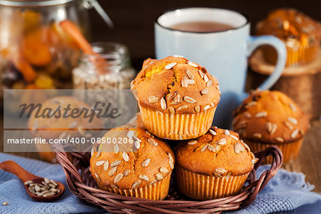 Fresh homemade delicious pumpkin muffins with sunflower seeds for breakfast