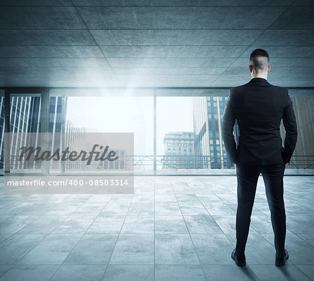 Businessman in an office overlooking the city