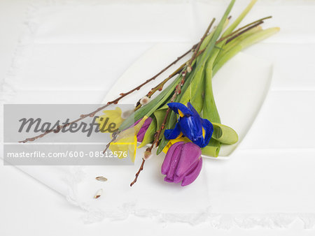 Close-up of Bouquet of Spring Flowers on Plate