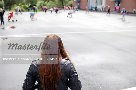 Alone girl on the school yard Alone girl on the school yard