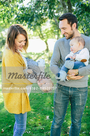 Family with two children in park