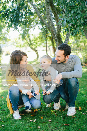 Family with two children in park