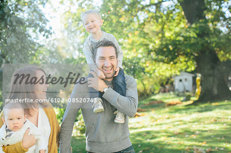 Family with two children in park
