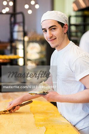 Baker working in bakery